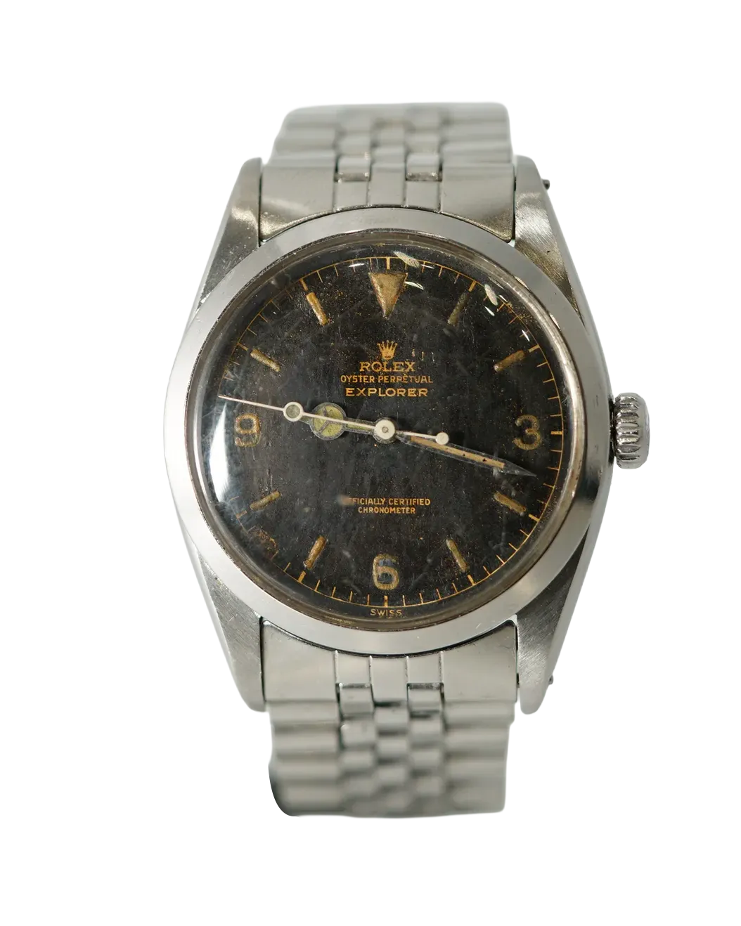 Dial detail of a vintage Rolex Explorer with black gilt dial, Mercedes hands, and steel Oyster bracelet.